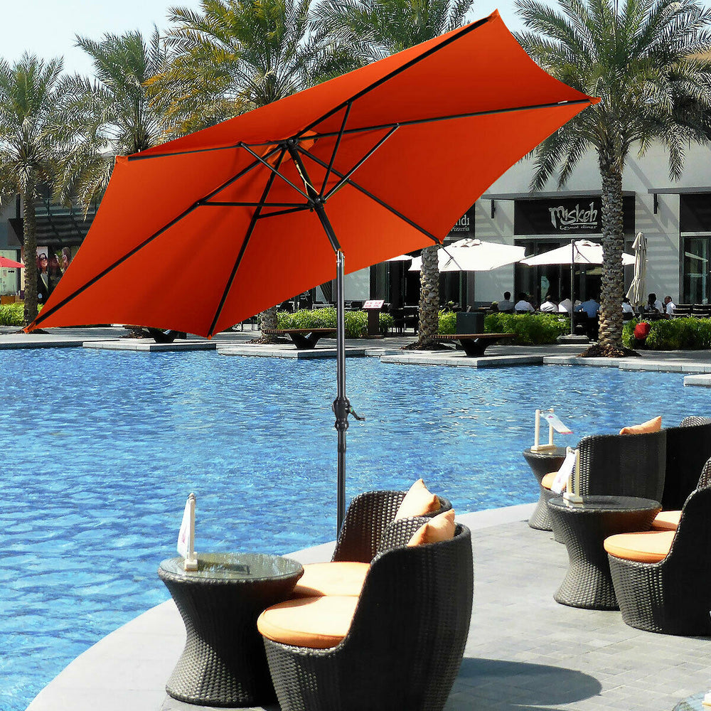 9 ft orange patio umbrella with crank, featuring a sturdy steel pole and hexagonal shape, ideal for outdoor protection.