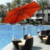 9 ft orange patio umbrella with crank, featuring a sturdy steel pole and hexagonal shape, ideal for outdoor protection.