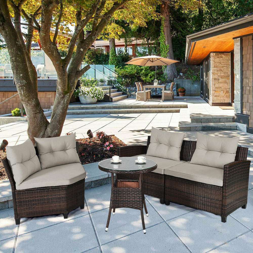 Side view of the outdoor wicker sofa set featuring plush cushions and sturdy armrests, ideal for garden or patio.