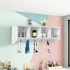 Wall-mounted storage cabinet with four compartments and five hooks, made of durable hard density board for versatile.