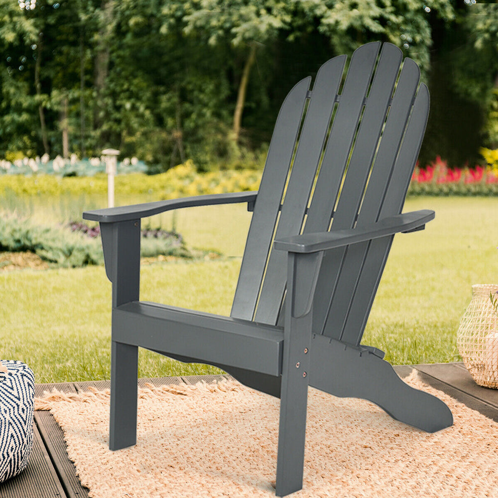 Gray acacia wood Adirondack chair with ergonomic design, perfect for outdoor patio relaxation and durable use.