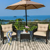 Outdoor patio rattan conversation set with beige cushions, featuring a tempered glass table, perfect for relaxation.