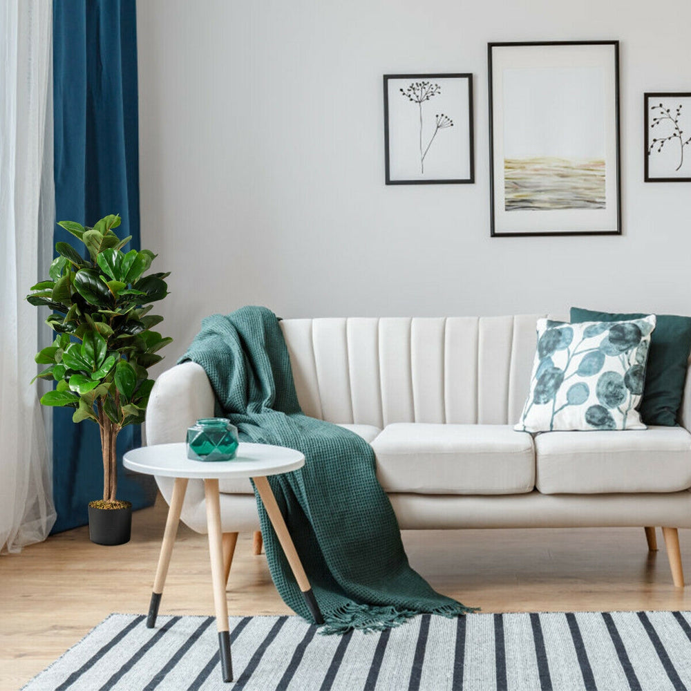 Artificial fiddle leaf fig tree in decorative planter, perfect for indoor or outdoor decoration, with natural-looking.