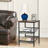 3-tier industrial end table with adjustable mesh shelves and sturdy steel frame, perfect for living room or bedroom use.