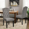 Set of 2 gray tufted upholstered dining chairs with rubberwood legs, perfect for home or café use.
