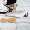 Manual tile cutter with sharp tungsten carbide blade, ergonomic handle, and adjustable side brackets for accurate.
