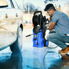Electric pressure washer in blue, 1800W, 2030 PSI, shown in use for car cleaning with hose reel and adjustable spray.