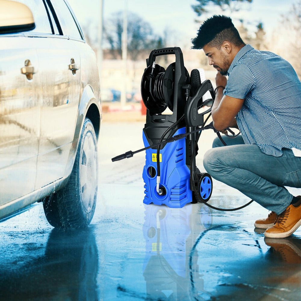 Electric pressure washer in blue, 1800W, 2030 PSI, shown in use for car cleaning with hose reel and adjustable spray.