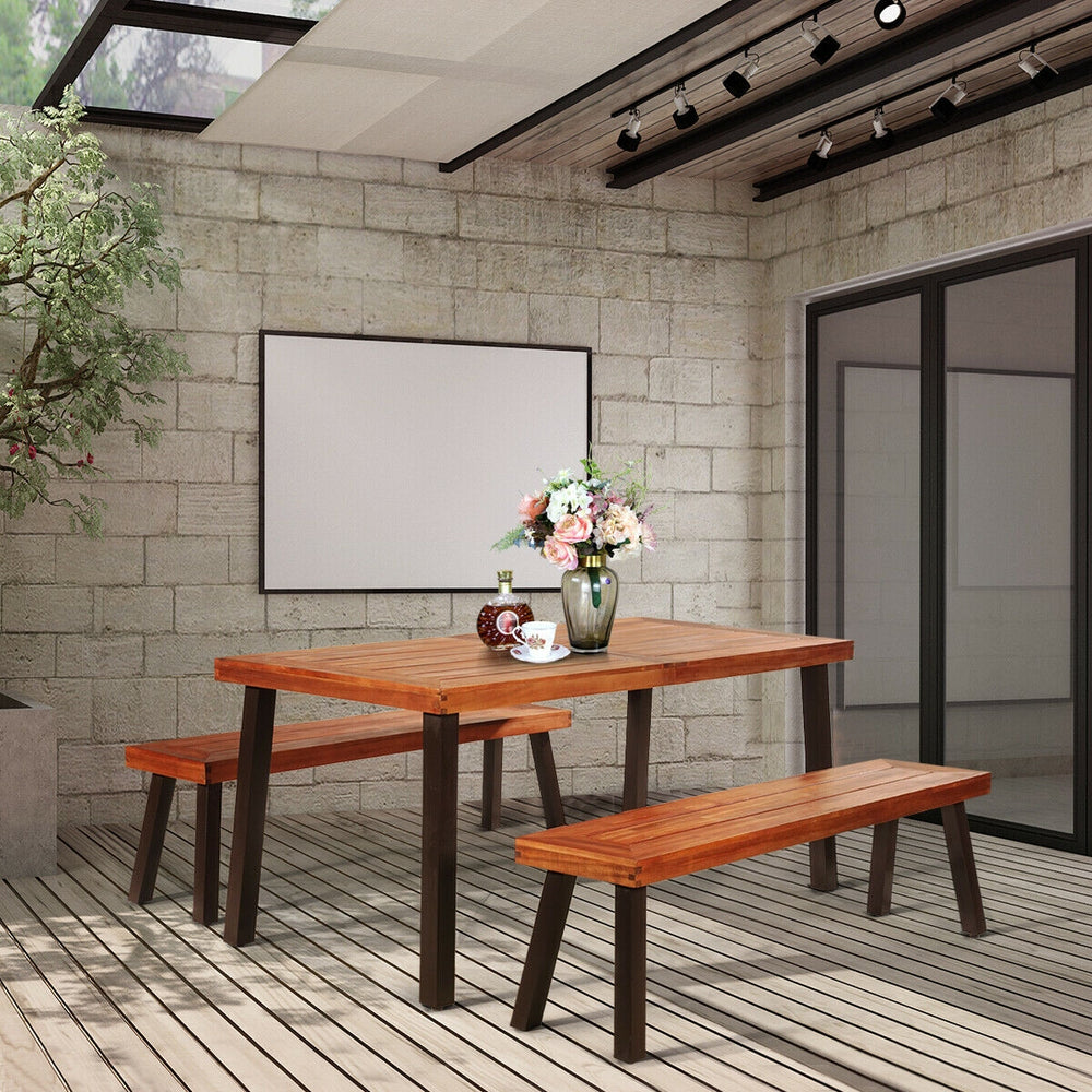 Rectangular acacia wood dining table with steel legs, featuring a waterproof surface, ideal for garden or patio use.