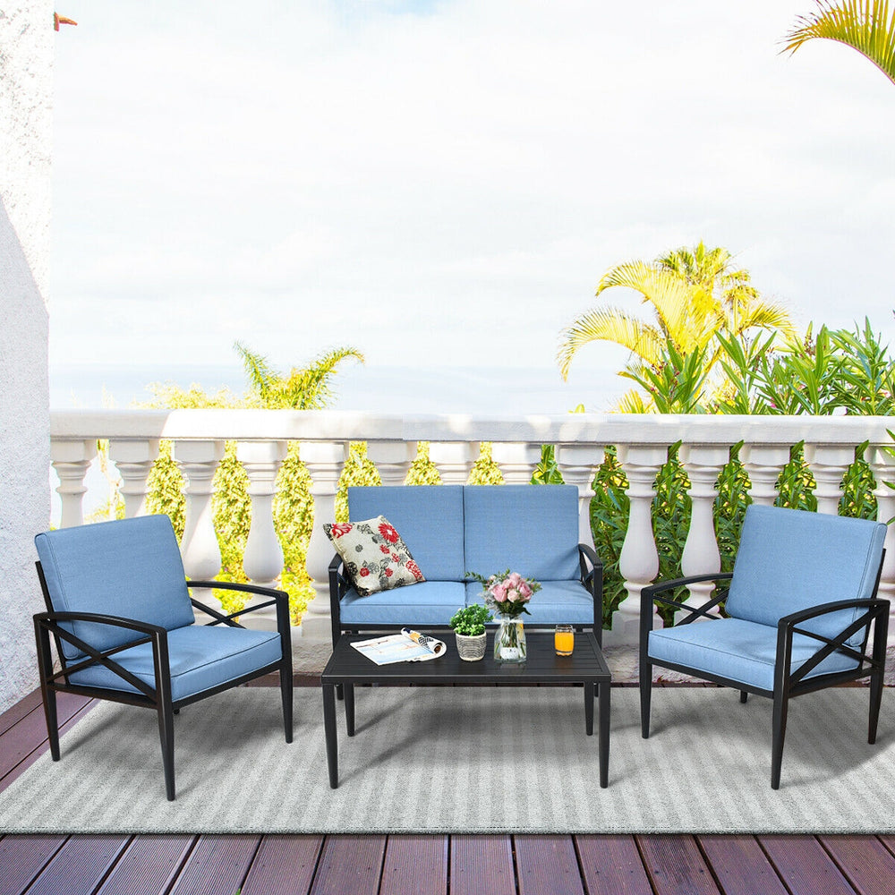 Patio furniture set featuring two cushioned single sofas and a side table, perfect for outdoor relaxation in any garden.