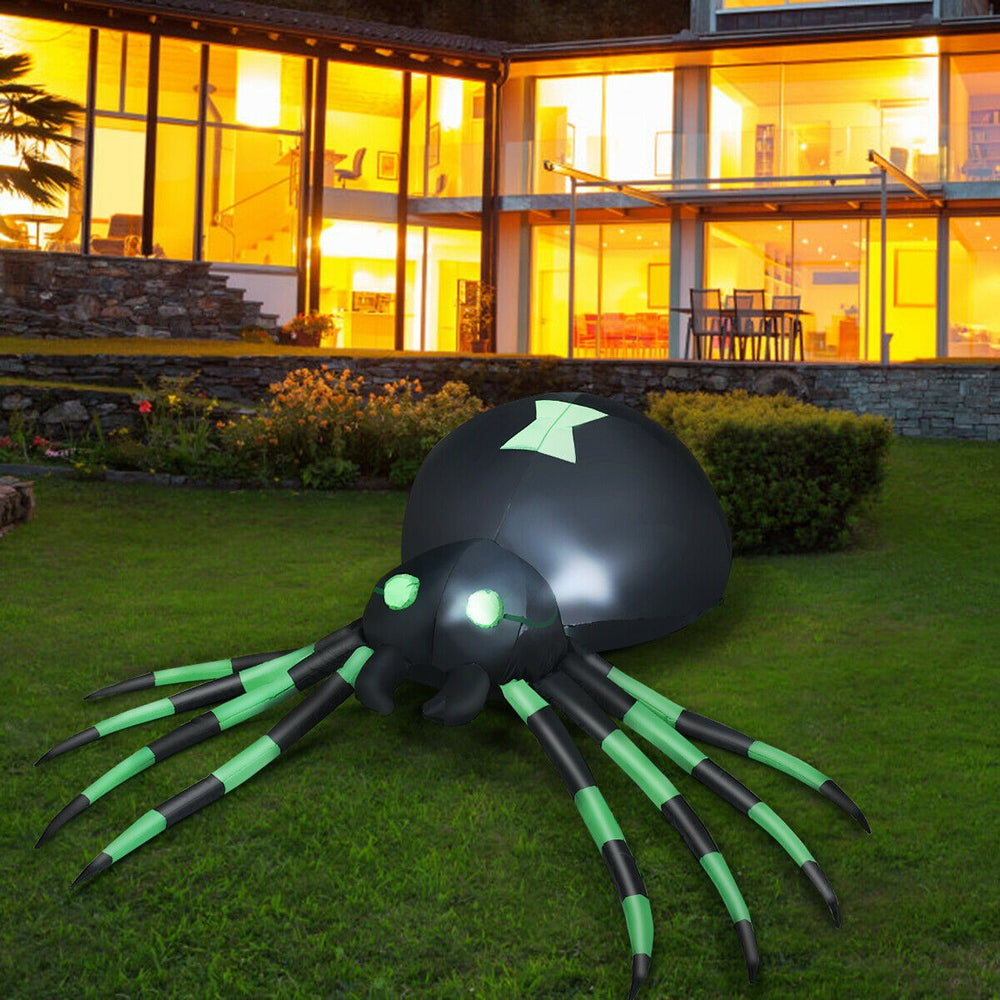 Giant 6-foot inflatable Halloween spider with LED eyes, made of durable polyester, perfect for outdoor decor.