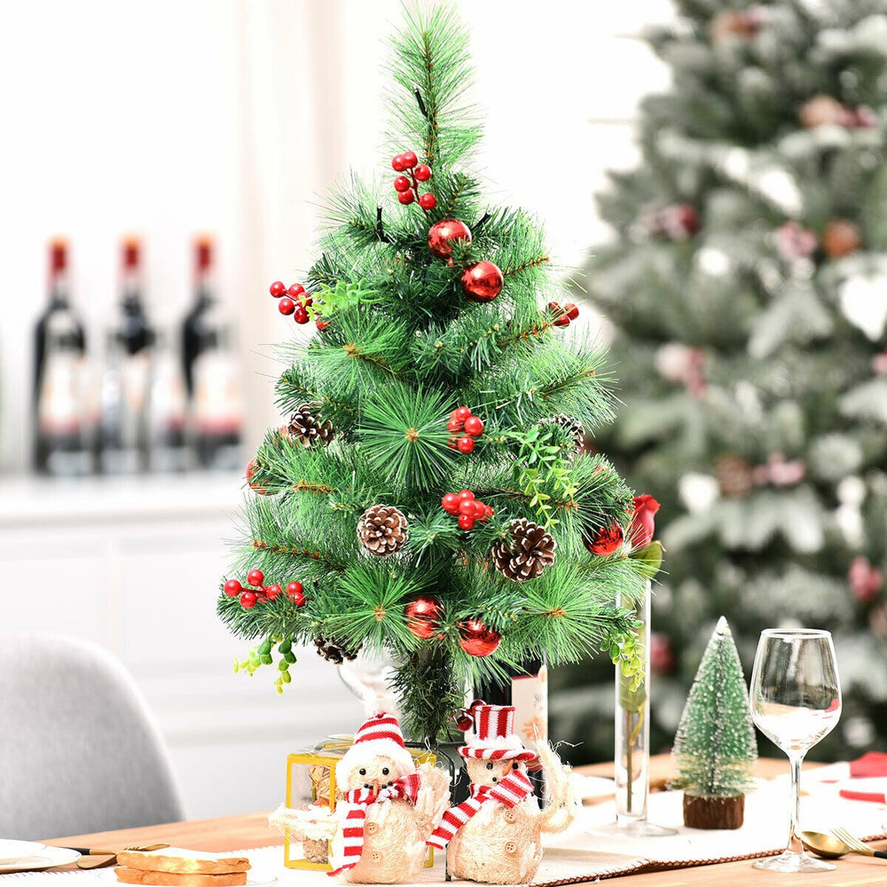 Decorative 29-inch pre-lit Christmas tree with rich ornaments and pine cones, perfect for festive holiday displays.