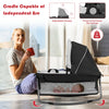 4-in-1 portable baby play yard in red with adjustable canopy, featuring a cradle and toys for versatile use.