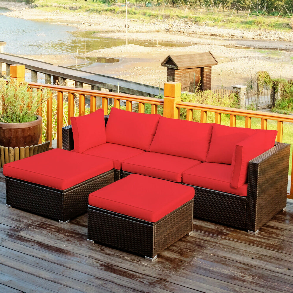 L-shaped 5-piece patio rattan sofa set with red cushions and ottoman, perfect for outdoor relaxation and gatherings.