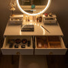 Vanity set featuring a lighted touch screen mirror, four storage drawers, and solid beech wood legs for stability.