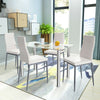 5-piece dining set featuring a clear glass table and four white PVC leather chairs, perfect for modern dining spaces.