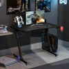 Gaming desk featuring a carbon fiber textured surface, cup holder, and blue LED lights for an enhanced gaming.
