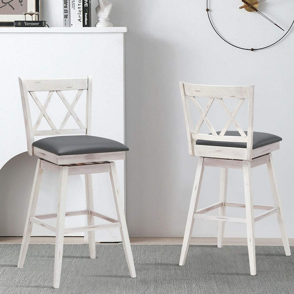 Set of 2 white swivel counter height barstools with rubberwood legs and comfortable PVC leather cushions for versatile.