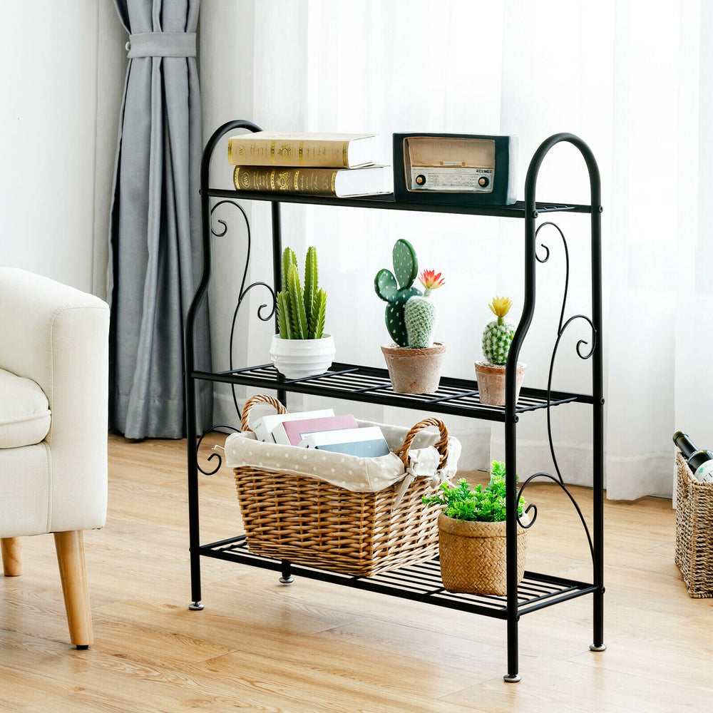Black 3-tier metal plant stand with scrollwork design, perfect for organizing plants and decor in any space.