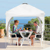 Pop-up height adjustable canopy tent in white, providing 6.6'x6.6' shade for outdoor dining and activities.