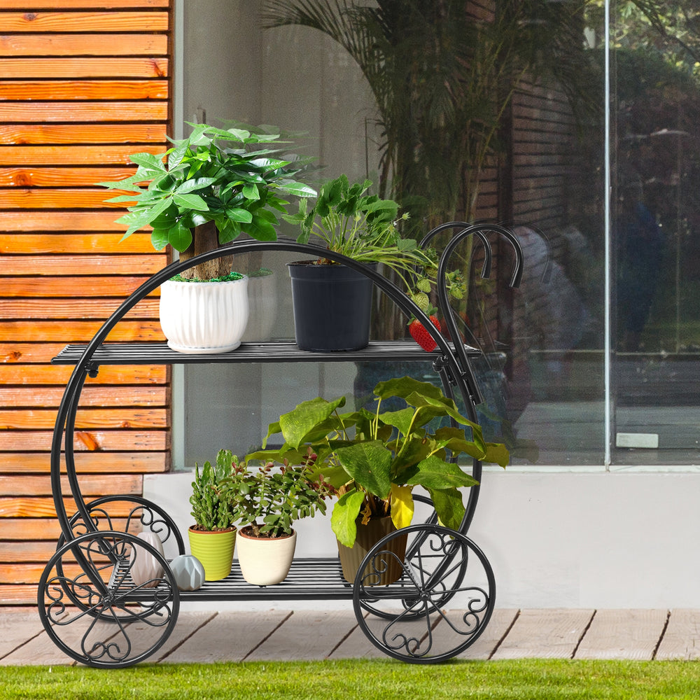 Two-tier heavy duty metal flower cart plant stand displaying potted plants, featuring a circular frame and decorative.
