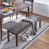 Upholstered entryway bench footstool with wood legs, featuring soft linen fabric and thick foam for comfortable seating.
