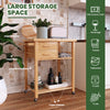 Bamboo kitchen trolley cart with large countertop, towel rack, 2 drawers, and open shelves for versatile storage.