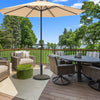 Patio market umbrella base stand with rattan design, durable resin, and anti-rust steel for stability, ideal for.