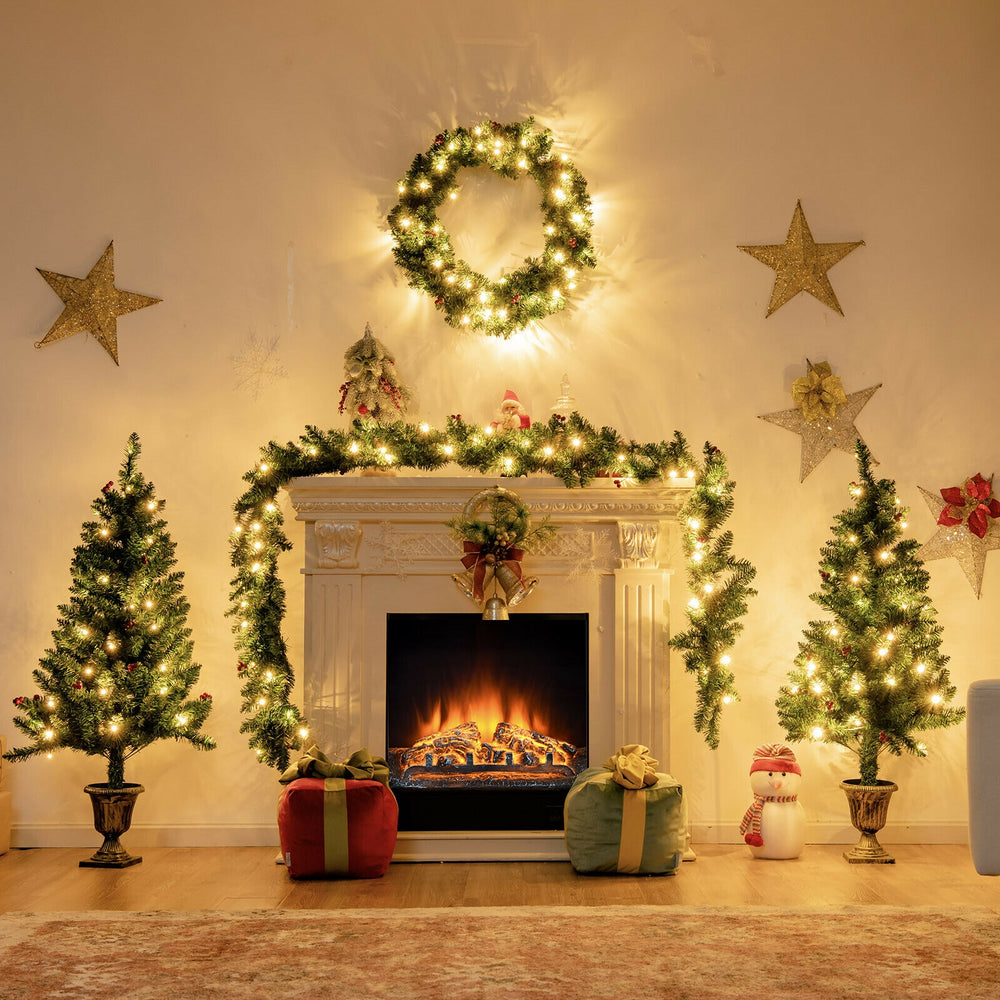 Christmas decoration set featuring a pre-lit wreath, garland, and two entrance trees for festive home decor.
