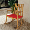 Acacia wood rocking chair with red cushion, featuring sturdy design and armrests, perfect for garden relaxation.