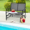 Gray iron patio rocking chair for two, featuring a durable metal frame, perfect for outdoor relaxation by the pool.