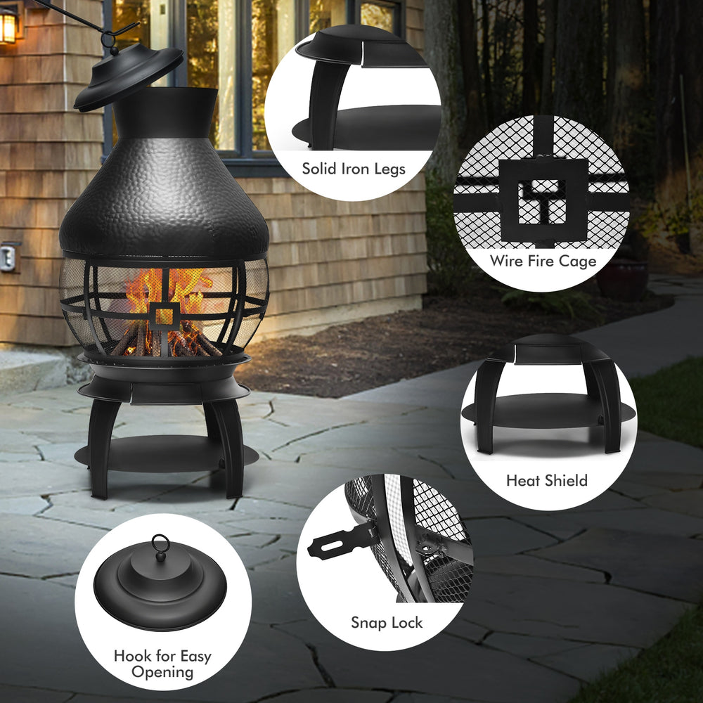 Patio wood burning chimney fireplace with solid iron legs, wire fire cage, and heat shield for outdoor use.
