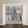 Adjustable wall-mounted closet rack system with shelves and hanging rods, made of powder-coated steel for durability.