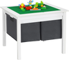 Kids double-sided activity table with drawers, featuring a green building block surface for creative play and storage.