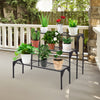 Three-tier metal plant stand showcasing various potted plants, ideal for outdoor patio decor and organization.