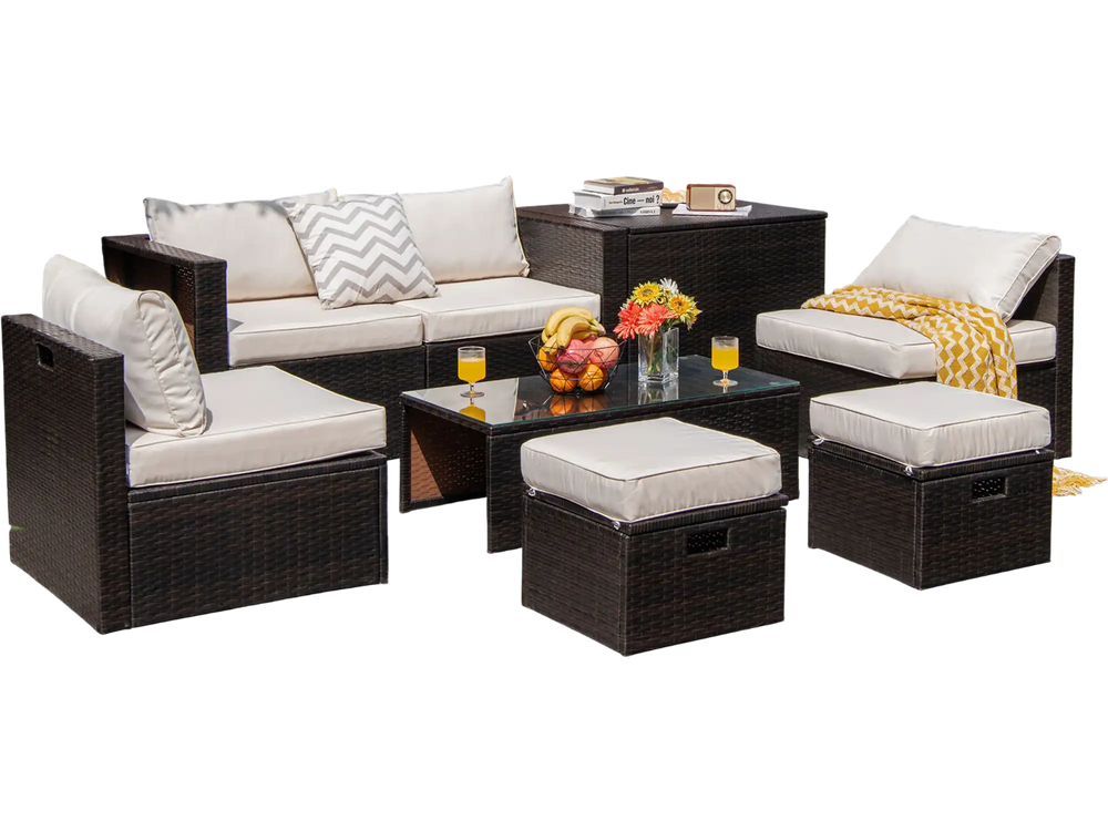 8-piece patio rattan furniture set with soft cushions, storage box, and tempered glass table for outdoor gatherings.