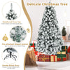 6 ft pre-lit snow flocked artificial Christmas tree with sturdy metal base, ideal for festive home and office.