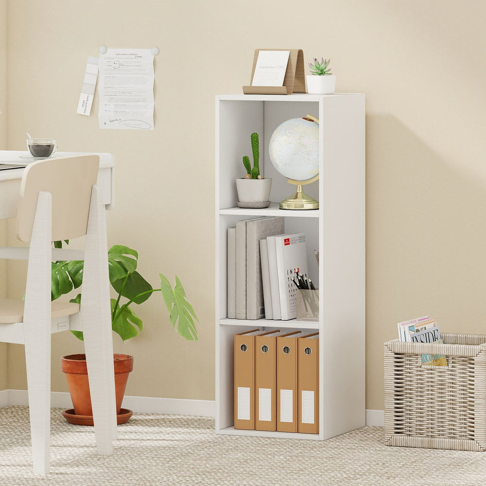 Modern white 3-cube bookshelf with open storage for books and decor, perfect for living rooms or studies.