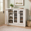 Stylish 3-door shoe cabinet in white featuring fluted transparent doors, perfect for showcasing and organizing footwear.