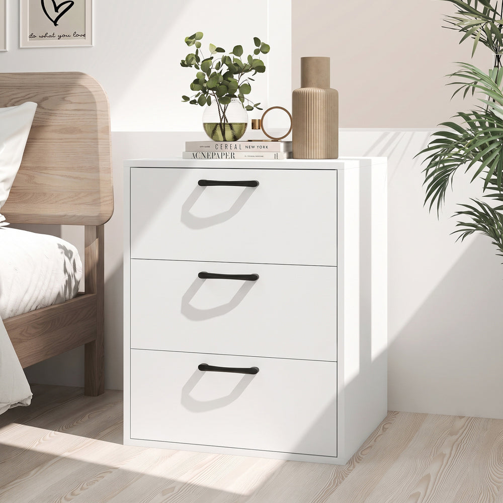 Three-drawer nightstand in white with wood grain finish, featuring sturdy construction and convenient handles for easy access.