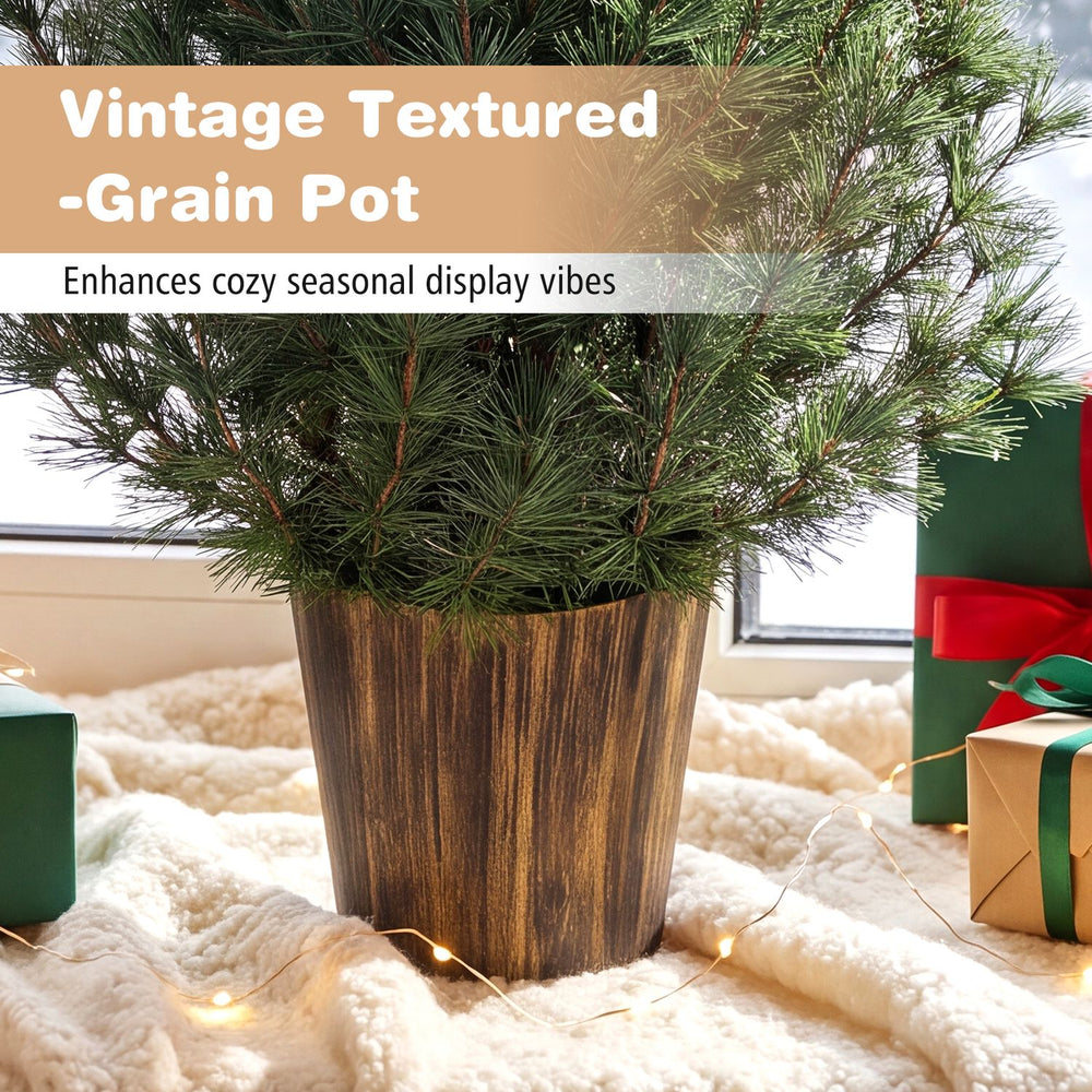 3 ft artificial Christmas tree in a vintage textured flowerpot, perfect for festive decor in small spaces.