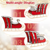 Side view of 3 FT Christmas metal sleigh decoration in red with elegant black and gold scrollwork, ideal for festive.