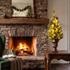 Pre-lit 3 FT Christmas tree with 40 LED lights, gold urn base, red berries, and pine cones for festive tabletop decor.