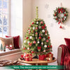 Decorated 3 FT Mini Tabletop Christmas Tree with 113 Green PVC Branch Tips displayed in a festive living room.