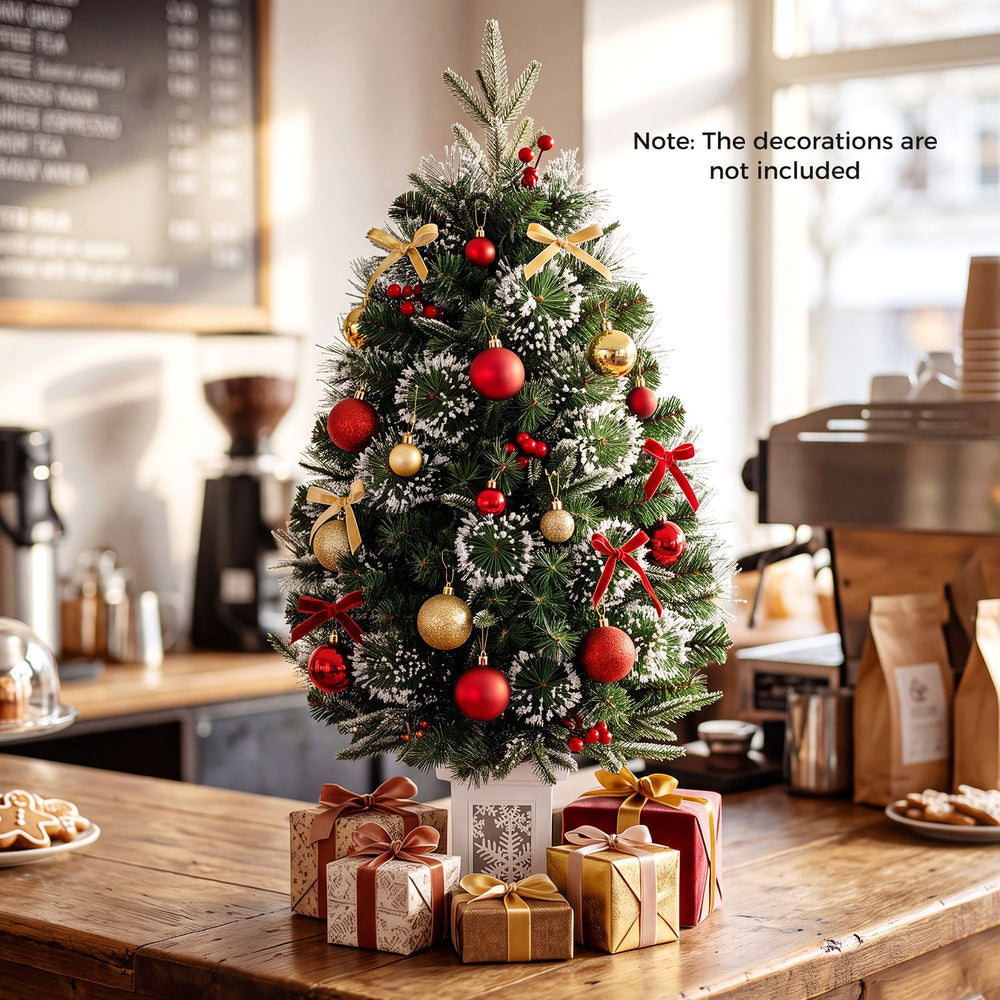3 FT pre-lit potted Christmas tree with 80 warm white LED lights, perfect for festive decoration in any setting.