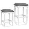 Set of 2 square saddle stools in gray with padded seats, solid rubber wood frame, and adjustable foot pads for.