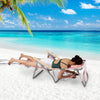 3-in-1 foldable beach chair in pink, adjustable backrest and footrest, perfect for sunbathing and lounging by the sea.