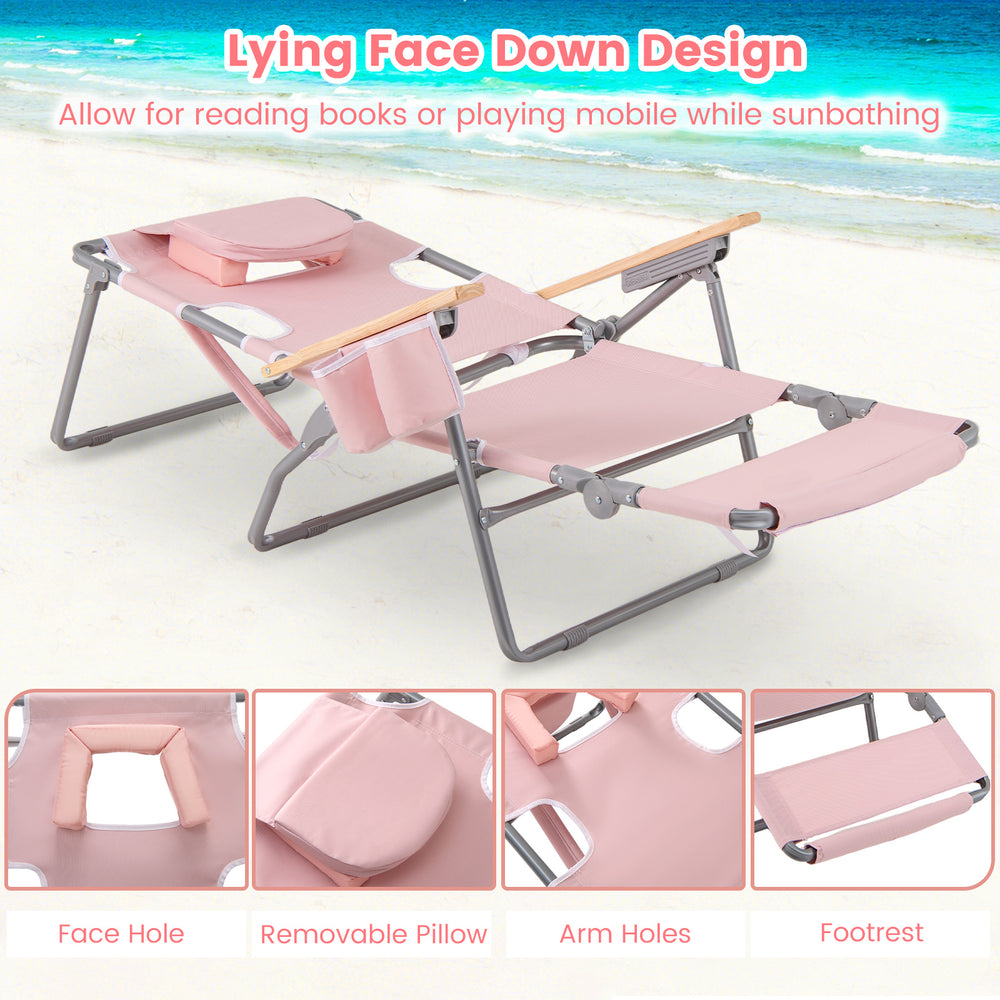 Foldable pink beach chair with footrest, face hole, and adjustable backrest for sunbathing and lounging.