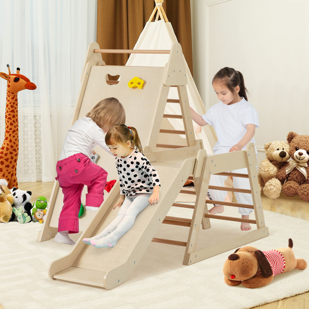 Indoor playground featuring a natural wood 3-in-1 jungle gym with slide, climbing ladders, and kids playing safely.