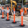 Traffic delineator posts with fillable bases, featuring reflective collars for visibility, ideal for construction and.
